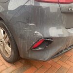 Before photo of KIA rear bumper scuff in Kidderminster – passenger side corner damage before mobile repair